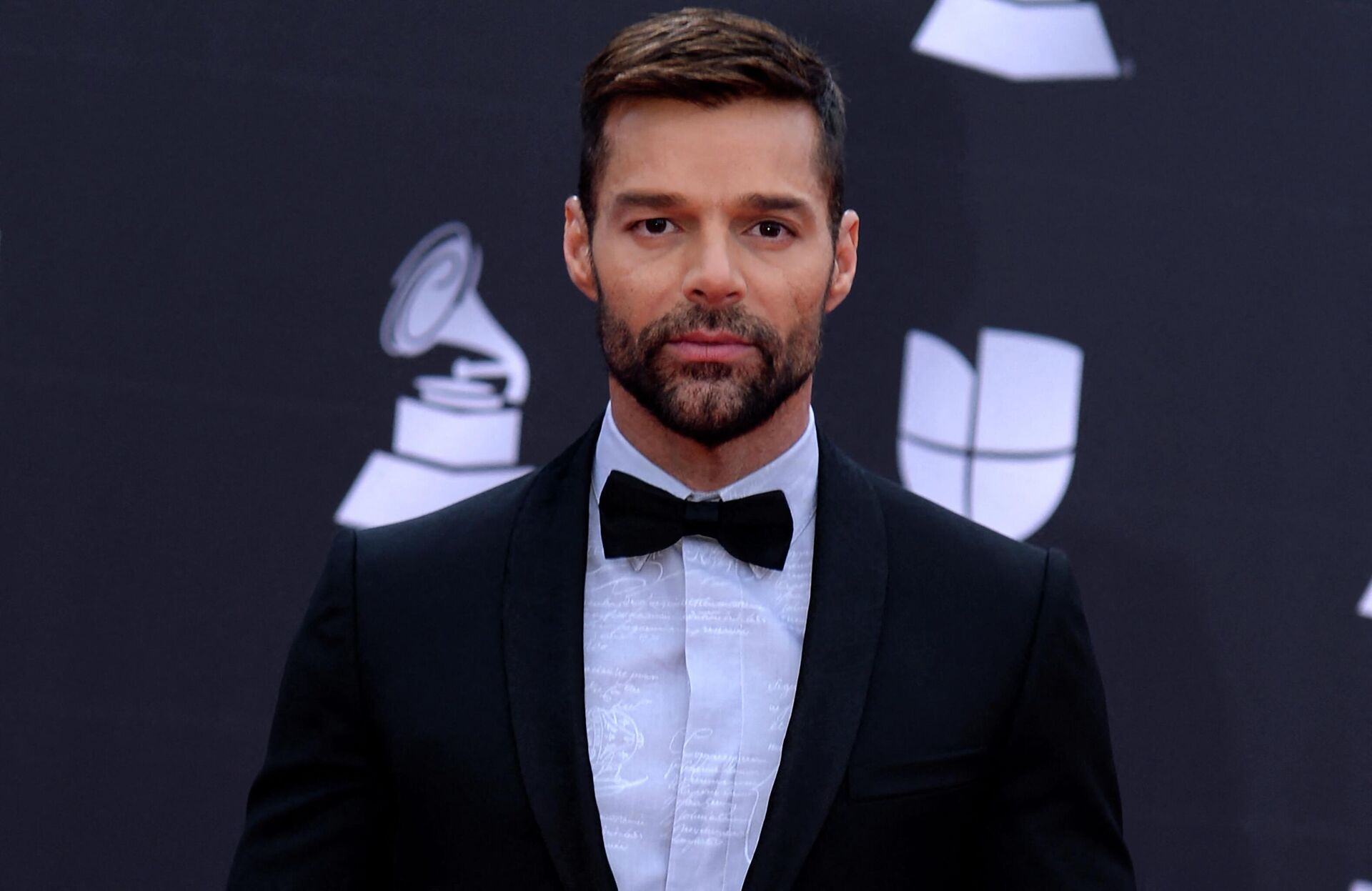 In this file photo taken on November 14, 2019 Puerto Rican musician and host Ricky Martin arrives at the 20th Annual Latin Grammy Awards in Las Vegas, Nevada. - Sputnik International, 1920, 17.07.2022