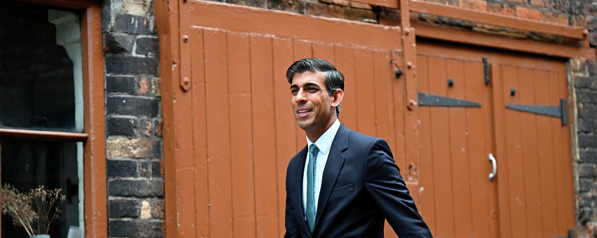 FILE - Britain's Chancellor of the Exchequer Rishi Sunak arrives for a regional cabinet meeting at Middleport Pottery in Stoke on Trent, England, Thursday, May 12, 2022 - Sputnik International, 1920, 24.10.2022