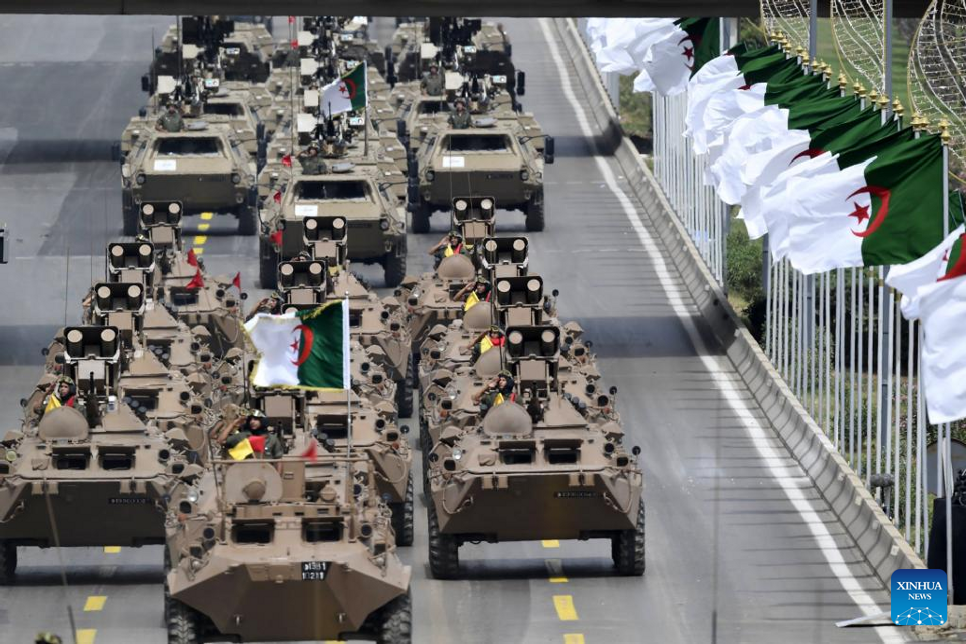 Military vehicles are driven during a military parade to celebrate the 60th anniversary of Algeria's independence in Algiers, capital of Algeria, on July 5, 2022. Algeria on Tuesday held a grand military parade to celebrate the 60th anniversary of its independence from French colonialism, with the attendance of senior local and foreign officials - Sputnik International, 1920, 06.07.2022