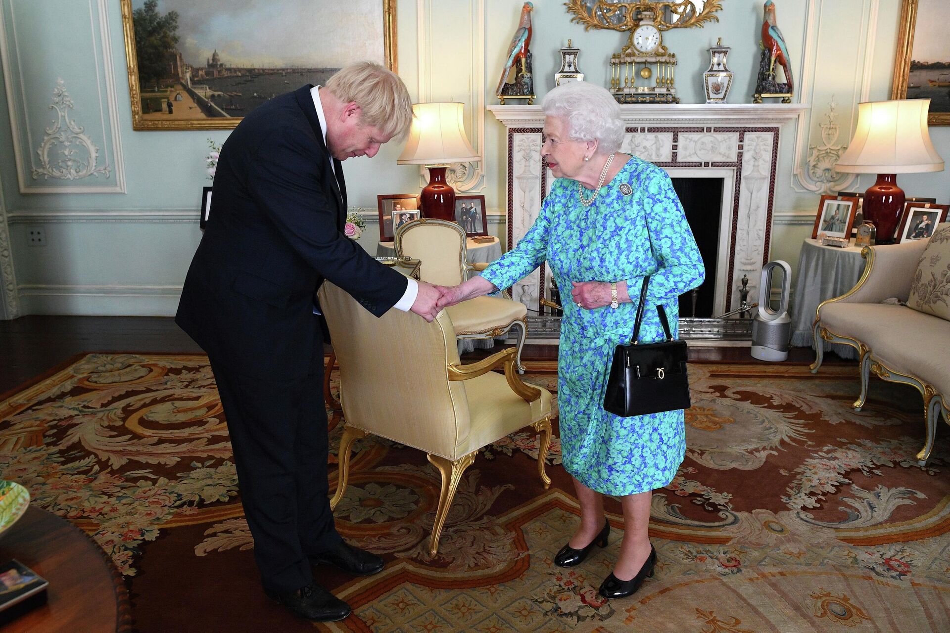 FILE - Britain's Queen Elizabeth II welcomes newly elected leader of the Conservative party Boris Johnson during an audience at Buckingham Palace, London, Wednesday July 24, 2019 where she invited him to become Prime Minister and form a new government - Sputnik International, 1920, 09.09.2022