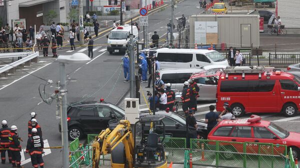 A general view shows workers at the scene after an attack on Japan's former prime minister Shinzo Abe at Kintetsu Yamato-Saidaiji station square in Nara on July 8, 2022 - Sputnik International