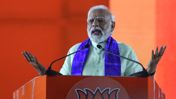 Indian Prime Minister Narendra Modi gestures as he speaks during a public meeting in Hyderabad, India, Sunday, July 3, 2022 - Sputnik International