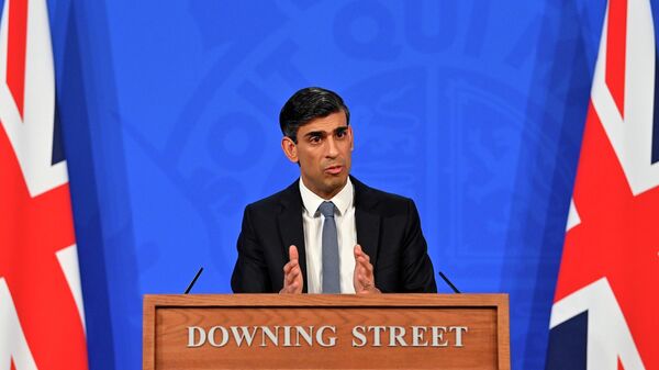 Britain's Chancellor of the Exchequer Rishi Sunak holds a press conference in the Downing Street briefing room, London, Thursday Feb. 3, 2022. Britain's energy regulator announced Thursday that a cap on energy prices is going up by a record 54% because of the soaring costs of wholesale natural gas, a change that will significantly burden millions of households already squeezed by rapidly climbing bills. - Sputnik International