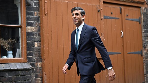 Britain's Chancellor of the Exchequer Rishi Sunak arrives to attend a Cabinet away day at Middleport Pottery in Stoke-on-Trent, central England, on May 12, 2022 - Sputnik International