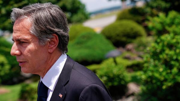 U.S. Secretary of State Antony Blinken speaks to the media before boarding his airplane at Yokota Air Base in Fussa on the outskirts of Tokyo Monday, July 11, 2022. Blinken arrived Monday on a previously unscheduled stop to Tokyo to offer condolences in person over the assassination of former Prime Minister Shinzo Abe. - Sputnik International