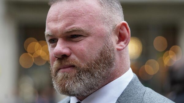 Former England footballer Wayne Rooney arrives to the High Court in central London for the start of the Wagatha Christie libel trial on May 10, 2022.  - Sputnik International