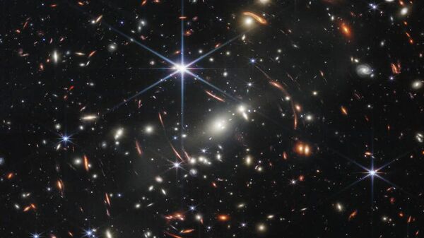 NASA’s James Webb Space Telescope has produced the deepest and sharpest infrared image of the distant universe to date. Known as Webb’s First Deep Field, this image of galaxy cluster SMACS 0723 is overflowing with detail. - Sputnik International