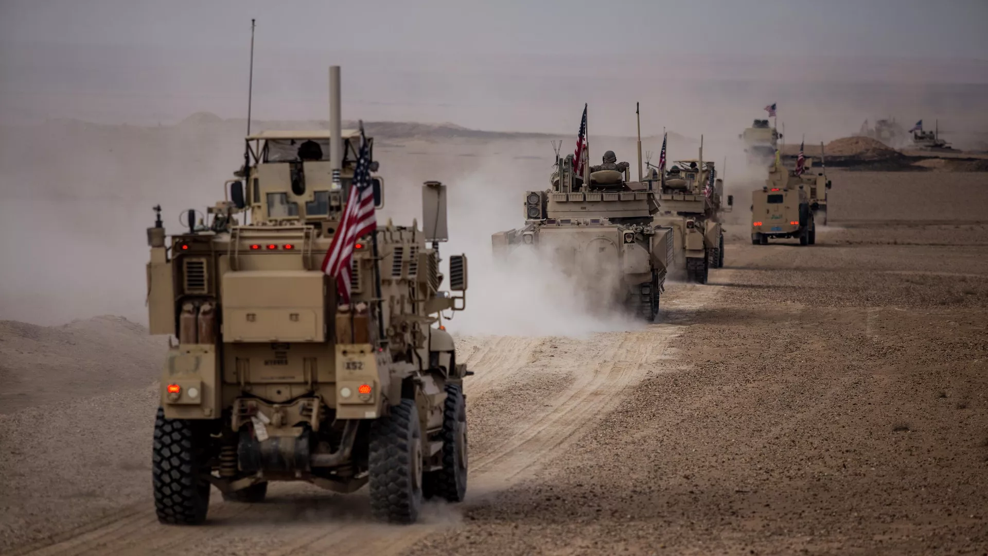 American military convoy rides during a joint exercise with Syrian Democratic Forces at the countryside of Deir Ezzor in northeastern Syria, Wednesday, Dec. 8, 2021 - Sputnik International, 1920, 11.12.2024