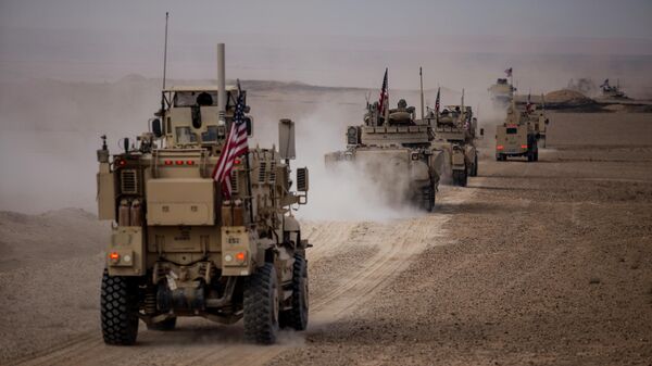 American military convoy rides during a joint exercise with Syrian Democratic Forces at the countryside of Deir Ezzor in northeastern Syria, Wednesday, Dec. 8, 2021 - Sputnik International