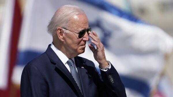 President Joe Biden adjusts his glasses during a welcoming ceremony upon his arrival at Ben Gurion International Airport near Tel Aviv, Israel Wednesday, July 13, 2022. Biden arrives in Israel on Wednesday for a three-day visit, his first as president.  - Sputnik International