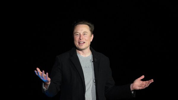(FILES) In this file photo taken on February 10, 2022 Elon Musk gestures as he speaks during a press conference at SpaceX's Starbase facility near Boca Chica Village in South Texas.  - Sputnik International
