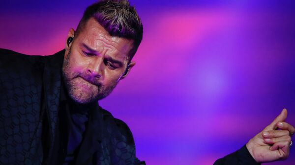 S) In this file photo taken on October 22, 2021 Puerto Rican singer Ricky Martin performs during the Enrique Iglesias and Ricky Martin Live in Concert joint tour at the FTX Arena in Miami, Florida.  - Sputnik International