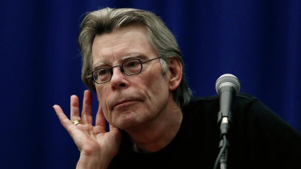 Novelist Stephen King listens to a question from a creative writing student at the University of Massachusetts-Lowell in Lowell, Mass., Friday, Dec. 7, 2012 - Sputnik International