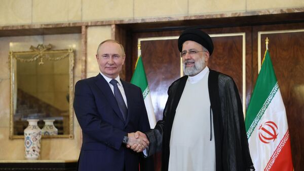 Vladimir Putin and Ebrahim Raisi, 19 July - Sputnik International