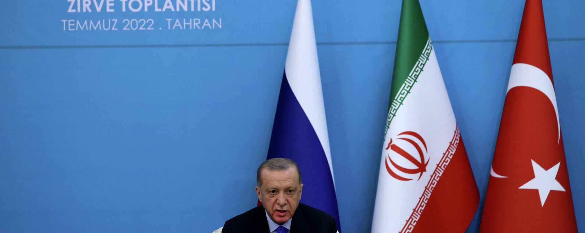 Turkish President Recep Tayyip Erdogan speaks during a joint press conference with his Iranian and Russian counterparts following their summit in Tehran on July 19, 2022. - Sputnik International, 1920, 20.07.2022