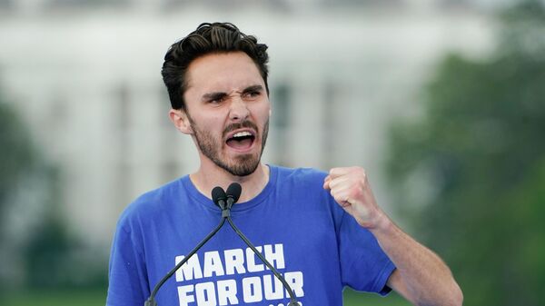 Parkland survivor and activist David Hogg speaks to the crowd during in the second March for Our Lives rally in support of gun control on Saturday, June 11, 2022, in Washington. The rally is a successor to the 2018 march organized by student protestors after the 2018 mass shooting at Marjory Stoneman Douglas High School in Parkland, Fla. - Sputnik International
