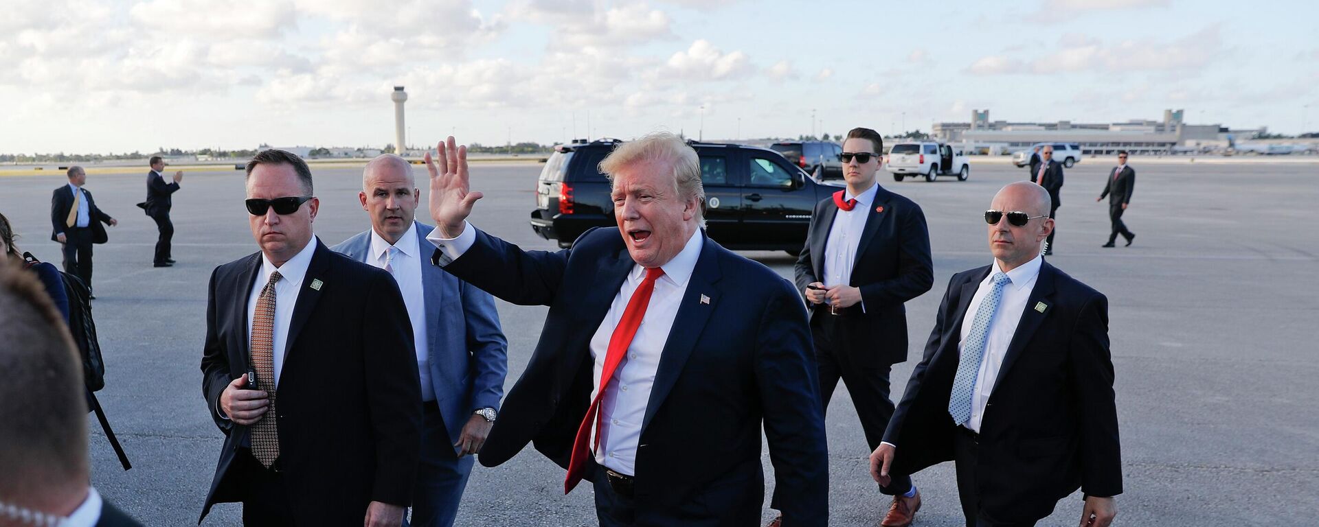 In this April 18, 2019, file photo, President Donald Trump, center, surrounded by members of the Secret Service, walks across the tarmac to begin to greet supporters during his arrival at Palm Beach International Airport, in West Palm Beach, Fla. As the Russia investigation threatened to shadow Donald Trump’s presidency, he became increasingly concerned he would be seen as a cheater and a fraud.  - Sputnik International, 1920, 21.07.2022