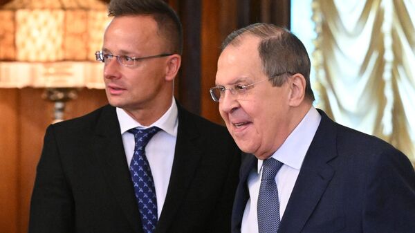 Russian Foreign Minister Sergei Lavrov and Hungarian Foreign Minister Peter Szijjarto in Moscow, Thursday July 21, 2022. - Sputnik International