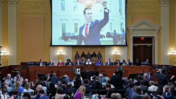 A photo of Sen. Josh Hawley, R-Mo., is displayed on a screen as the House select committee investigating the Jan. 6 attack on the U.S. Capitol holds a hearing at the Capitol in Washington, Thursday, July 21, 2022 - Sputnik International