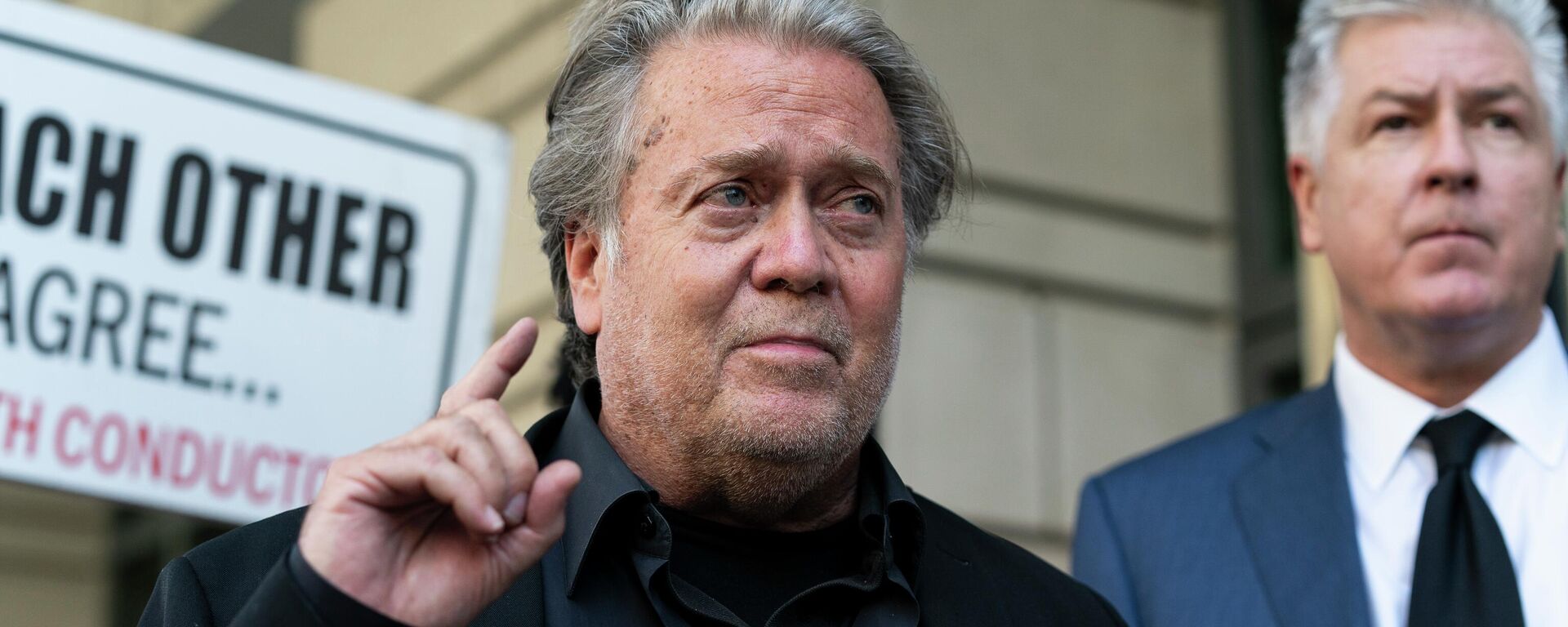 Former White House strategist Steve Bannon, left, speaks with reporters as he departs federal court on Friday, July 22, 2022, in Washington, with his attorney M. Evan Corcoran, right. Bannon, a longtime ally of former President Donald Trump has been convicted of contempt charges for defying a congressional subpoena from the House committee investigating the Jan. 6 insurrection at the U.S. Capitol. - Sputnik International, 1920, 24.07.2022