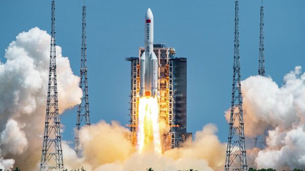 The rocket carrying China’s second module for its Tiangong space station lifts off from Wenchang spaceport in southern China on July 24, 2022. - Sputnik International