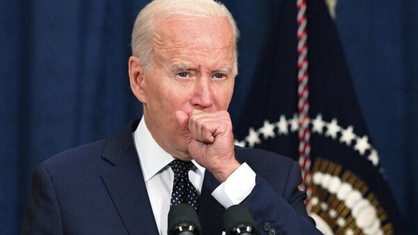 In this file photo taken on July 15, 2022, US President Joe Biden coughs as he speaks to the traveling press after taking part in a working session with Saudi Arabia's Crown Prince Mohammed bin Salman at the Al Salam Royal Palace in Jeddah, Saudi Arabia - Sputnik International