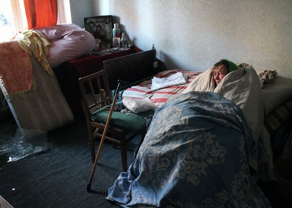 The most unprotected in this conflict were not only children, but also lonely, sick and elderly people. They had nowhere to run. This photo shows an elderly woman trying to keep herself warm under blankets. Her house in the Kievsky district of Donetsk was hit by Ukrainian artillery strikes in March 2017. - Sputnik International