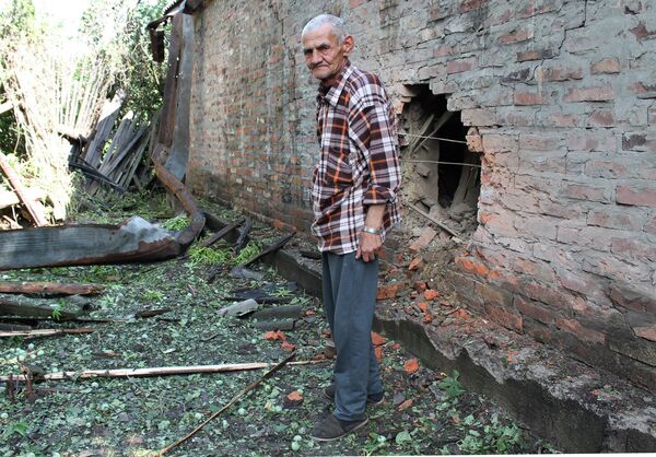 Ukrainian Armed Forces shelled this elderly man’s house. On July 15, 2015, the Ukrainian Army destroyed four residential houses in Gorlovka with artillery strikes. One woman was killed and another was seriously wounded and lost her leg in the shelling. The Ukrainian military did not consider it a war crime to shell houses with civilians including elderly people, children, and women. Thousands lost their lives, loved ones, health, or the roof over their heads during those eight years. - Sputnik International