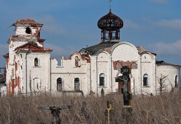 The Holy Iveron Convent in Donetsk, damaged by shelling, has become a testament to Ukrainian barbarism. In the fall of 2014, DPR forces began liberating the Donetsk airport, not far from the convent. That&#x27;s when the monastery and cemetery came under artillery fire from the new airport terminal, which at the time was controlled by the Ukrainian Armed Forces, including with incendiary shells. The cemetery was particularly damaged. - Sputnik International