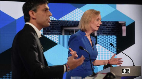 A handout picture released by the BBC, taken and received on July 25, 2022, shows Conservative politicians and candidates to be the the Leader of the Conservative Party, and Britain's next Prime Minister, Rishi Sunak (L) and Liss Truss, as they appear on the BBC's 'The UK's Next Prime Minister - Sputnik International