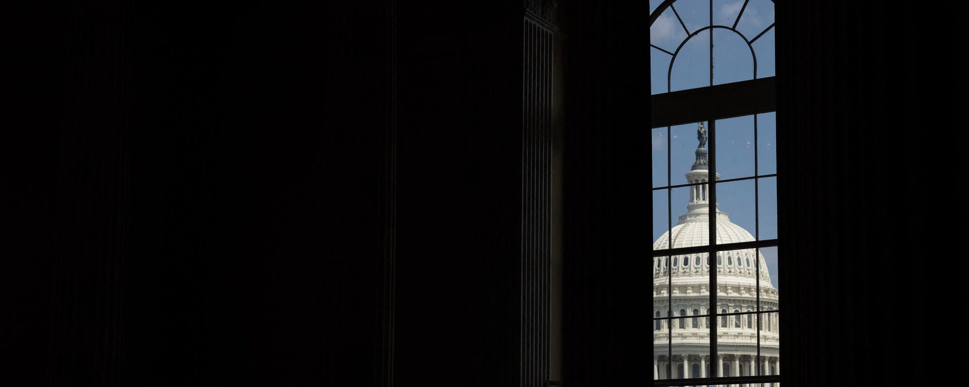 WASHINGTON, DC - JUNE 13: A view of the U.S. Capitol building from outside the hearing room during a hearing on the January 6th investigation in the Cannon House Office Building on June 13, 2022 in Washington, DC. - Sputnik International, 1920, 28.07.2022