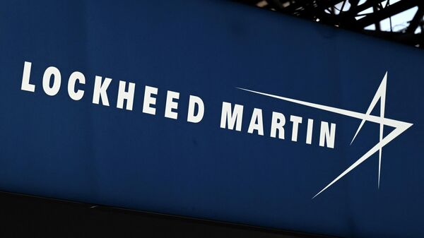 This photograph taken on June 13, 2022, shows the logo from US defence manufacturer Lockheed Martin on display at the Eurosatory international land and airland defence and security trade fair, in Villepinte, a northern suburb of Paris. (Photo by EMMANUEL DUNAND / AFP) - Sputnik International