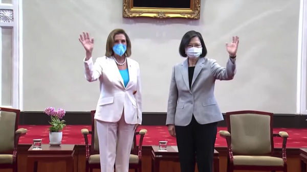 Screenshot captures moment US House Speaker Nancy Pelosi officially met Taiwanese President Tsai Ing Wen on August 3, 2022. - Sputnik International