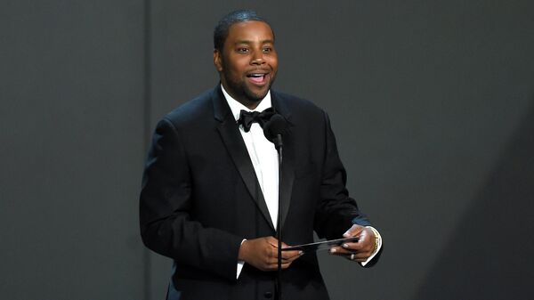 FILE - Kenan Thompson presents the award for outstanding drama series at the 70th Primetime Emmy Awards on Sept. 17, 2018, in Los Angeles. Thompson turns 43 on May 10 - Sputnik International