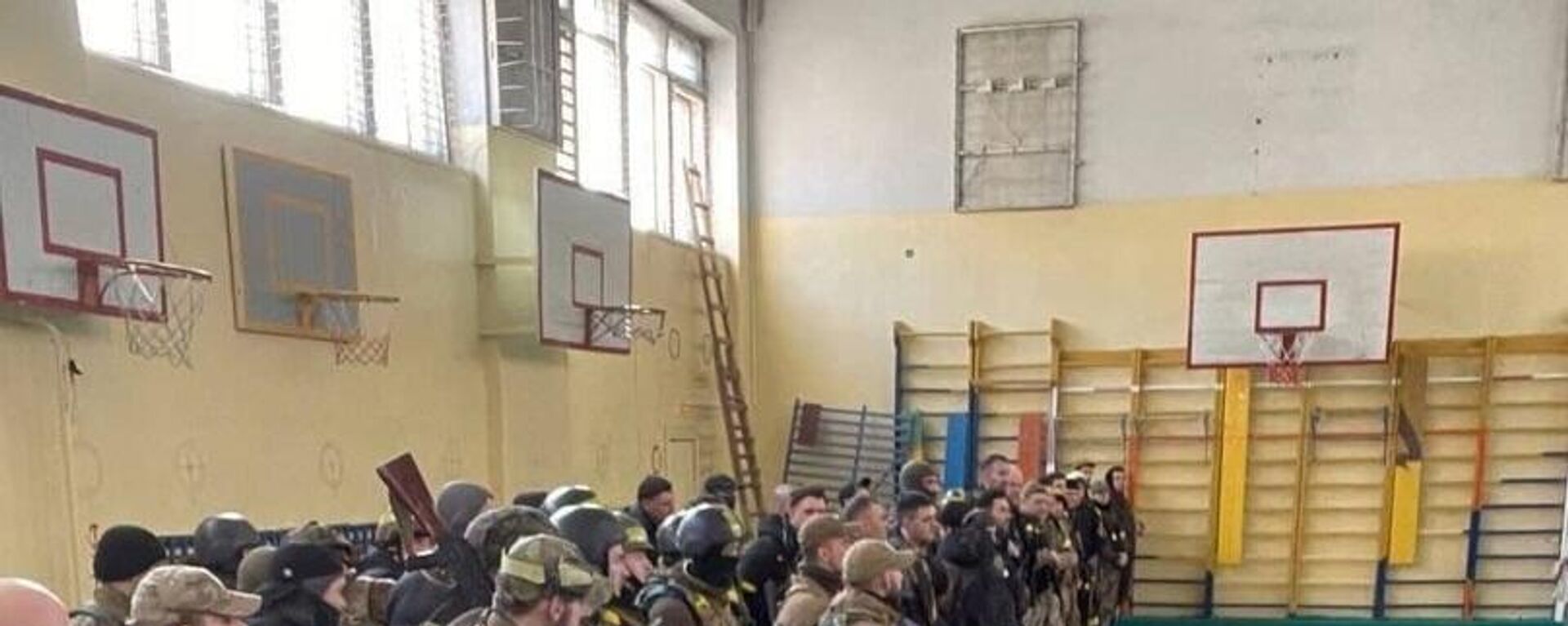Ukrainian forces destroyed in a school gym. Cropped image of Ukrainian soldier's social media selfie. - Sputnik International, 1920, 05.08.2022