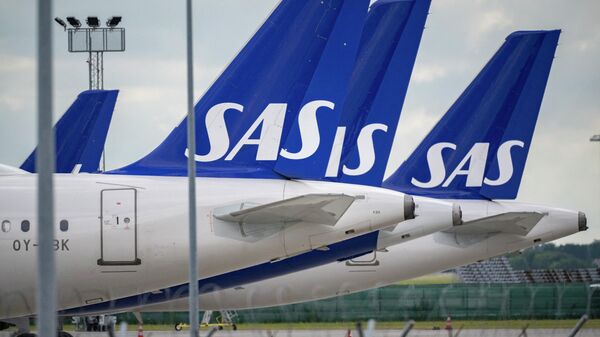 Scandinavian airline SAS aircraft of the type Airbus A321 and A320 Neo are parked at Kastrup airport on July 4, 2022 after the 900 pilots at SAS went on strike. - Sputnik International