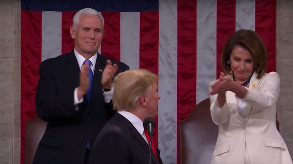 Nancy Pelosi claps for Donald Trump at State of the Union address. - Sputnik International