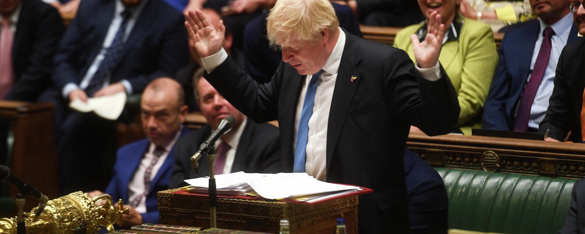 A handout photograph released by the UK Parliament shows Britain's Prime Minister Boris Johnson speaking during his final Prime Minister's Questions (PMQs) at the House of Commons in London on July 20, 2022 - Sputnik International, 1920, 09.08.2022