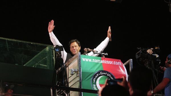 Former Pakistani Prime Minister Imran Khan waves to his supporters during an anti government rally, in Lahore, Pakistan, Thursday, April 21, 2022. - Sputnik International