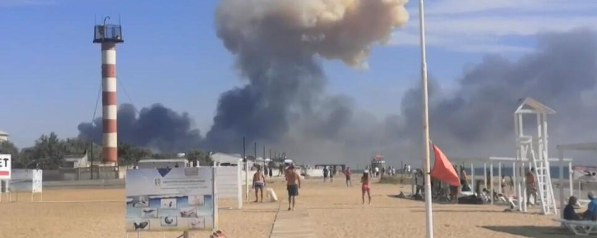 Smoke seen after the explosions at the Saki airfield in Crimea, Russia - Sputnik International, 1920, 09.08.2022