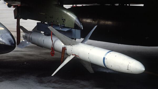 A view of an AGM-88 HARM high-speed anti-radiation missile mounted beneath the wing of a 37th Tactical Fighter Wing F-4G Phantom II Wild Weasel aircraft. - Sputnik International