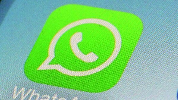 This Feb. 19, 2014, file photo, shows WhatsApp app icon on a smartphone in New York.   - Sputnik International