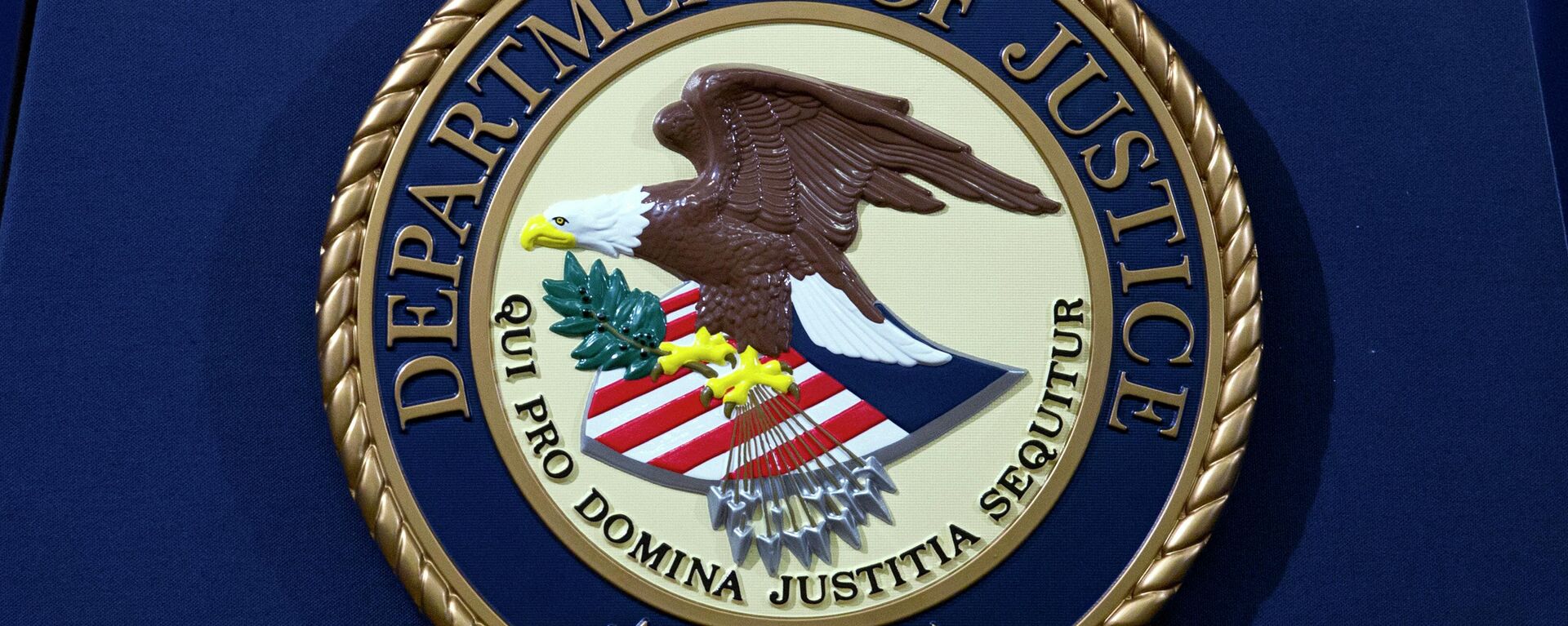 FILE - In this Nov. 28, 2018, file photo, the Department of Justice seal is seen in Washington, D.C. The Justice Department has released a new regulation spelling out detailed nationwide requirements for sex offender registration under a law Congress passed in 2006. The regulation released Monday stems from the Sex Offender Registration and Notification Act. It requires convicted sex offenders to register in the states in which they live, work or attend school.  (AP Photo/Jose Luis Magana, File) - Sputnik International, 1920, 19.08.2022