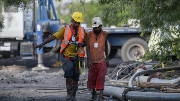Volunteer miners take part in an operation to reach ten colleagues trapped in a flooded coal mine, in the community of Agujita, Sabinas Municipality, Coahuila State, Mexico, on August 10, 2022 - Sputnik International