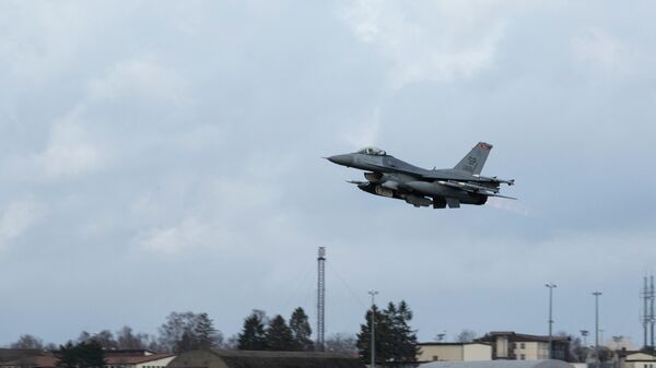 This image released by the US Department of Defense shows a US Air Force F-16 Fighting Falcons departing Spangdahlem Air Base, Germany, on February 11, 2022, for Fetesti Air Base in Romania. - Sputnik International