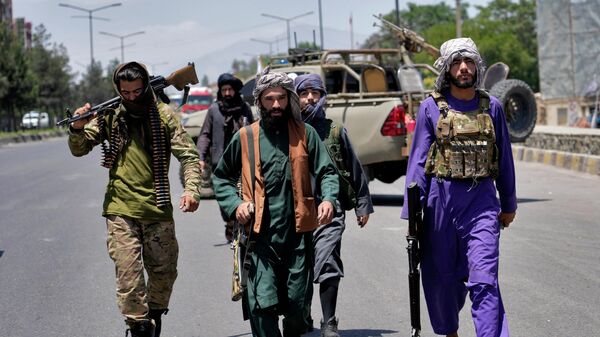 Taliban fighters guard at the site of an explosion in Kabul, Afghanistan, Saturday, June 18, 2022.  - Sputnik International