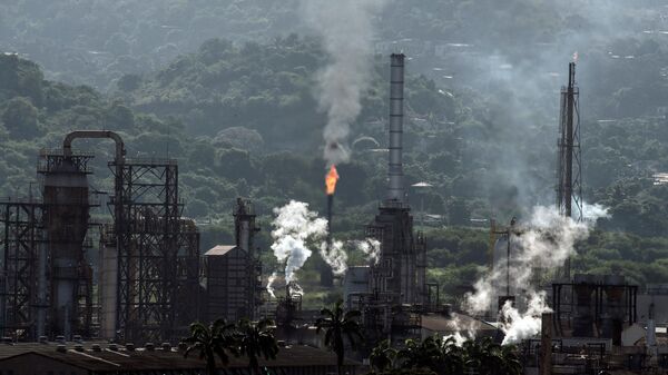 View of an oil refining plant of state-owned Petroleos de Venezuela (PDVSA) in Puerto La Cruz, Anzoategui state, Venezuela, on November 4, 2021 - Sputnik International