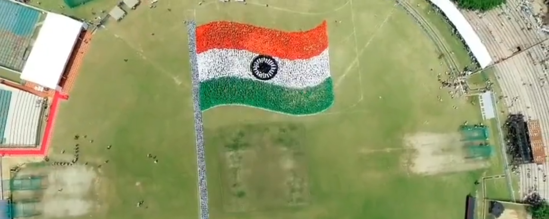 Screenshot from a video showing the record-breaking human image of India's national flag in Chandigarh - Sputnik International, 1920, 14.03.2024