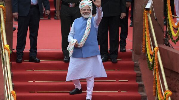 India's Prime Minister Narendra Modi gestures after addressing the nation from the ramparts of the Red Fort during the celebrations to mark country’s Independence Day in New Delhi on August 15, 2022. - Sputnik International