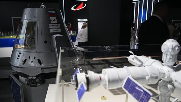 Models in the Roscosmos pavilion at the exhibition held as part of the International Military-Technical Forum ARMY-2022 at the Patriot Congress and Exhibition Center. - Sputnik International